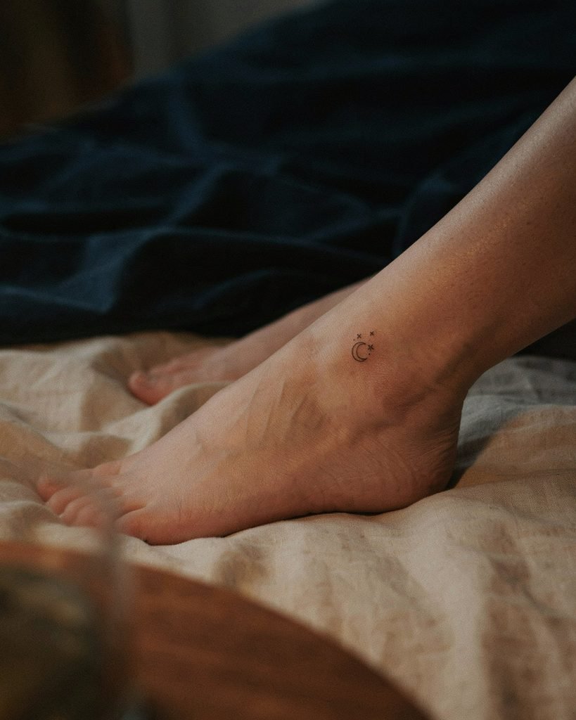 Moon and stars tattoo